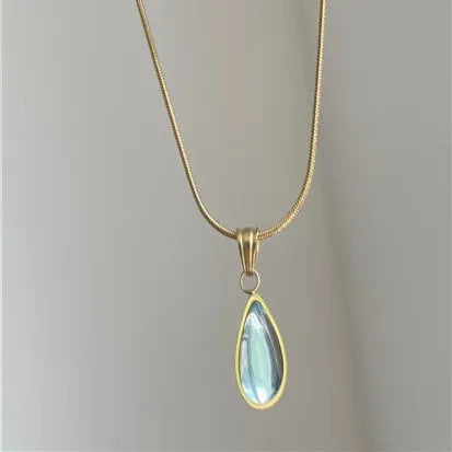 Retro blue and green water drop necklace with mixed gem inlaid pendant on titanium steel snake bone chain.