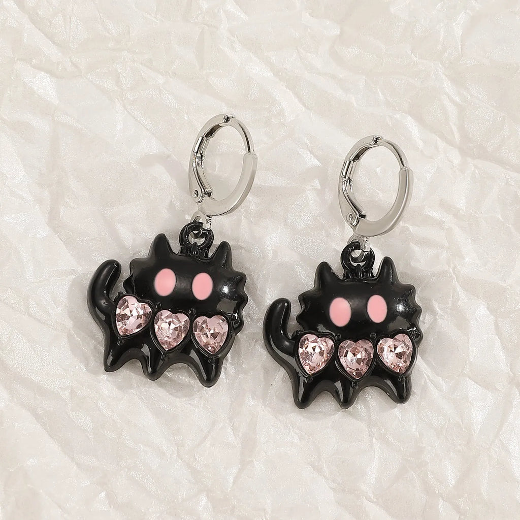 Women's alloy earrings with cross crystal design in five colour options including white, black cat, and antique silver