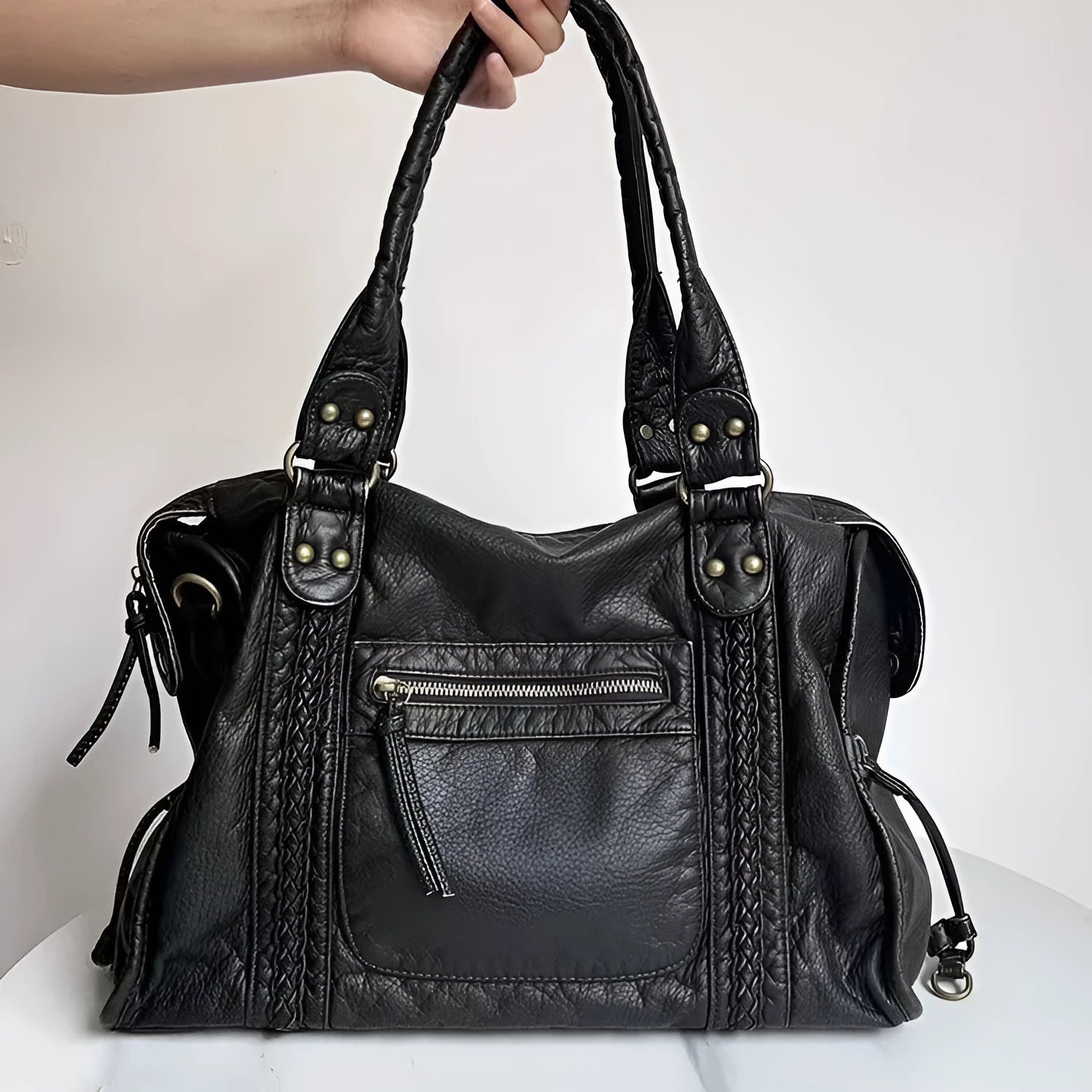 Women's retro motorcycle shoulder bag in bright black with golden edge or brown, showing internal compartments and slit pockets