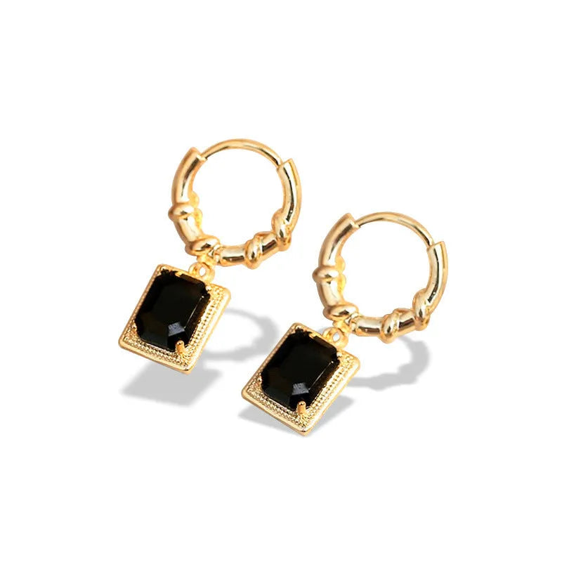 Geometric quadrilateral copper earrings with black zirconia centrepiece in French Court Retro style for women.