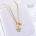 Gold colour epoxy butterfly jewellery set with titanium steel necklace and bracelet showing snake bones chain style