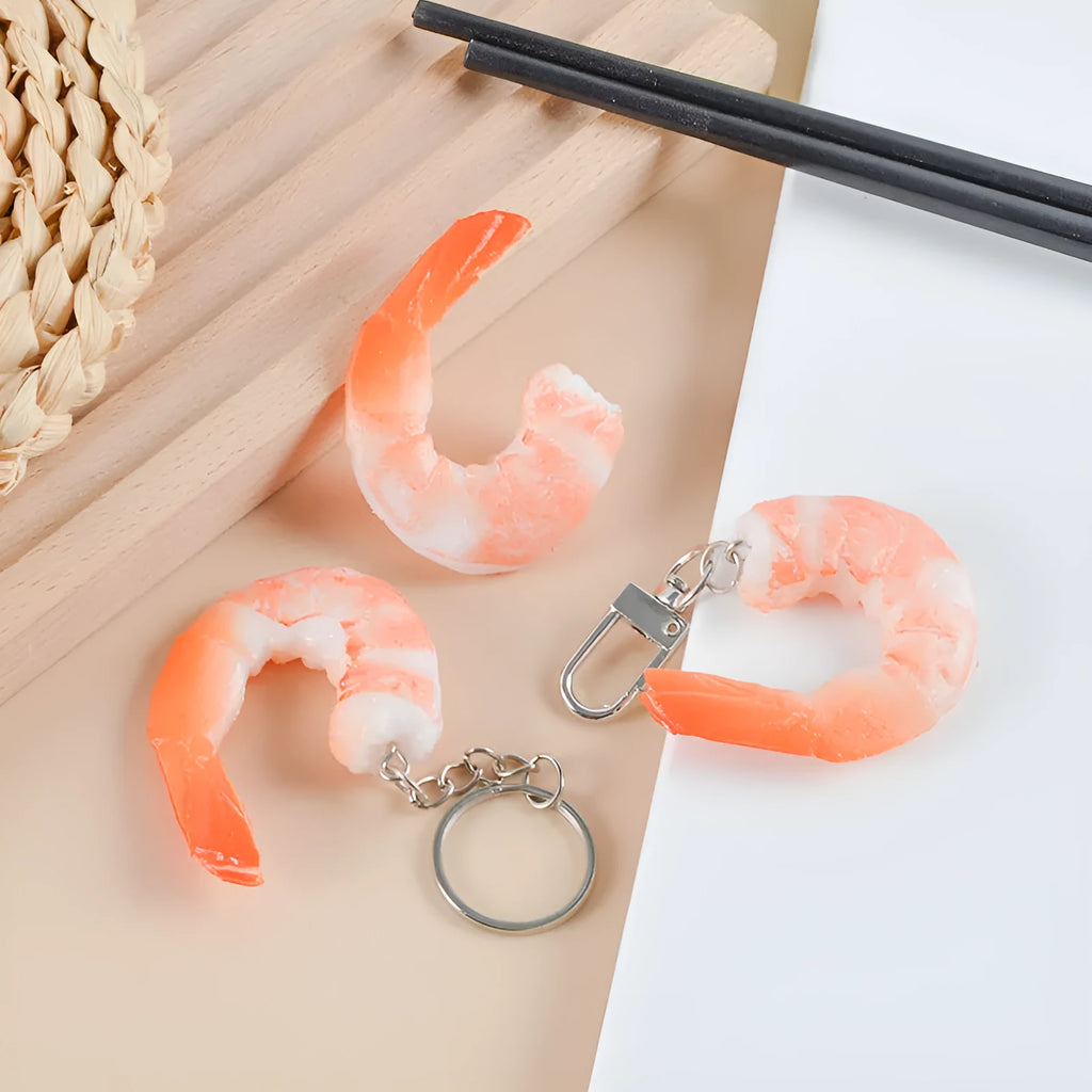 PVC simulation shrimp keychain on a key ring, showing its 1.5cm thickness and modern design.