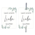 Pack of 50 white decorative paper labels with Fireworks and I Make Love print for events.