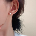 Women's fashion fishtail earrings in electroplated white gold or yellow gold colour on copper base