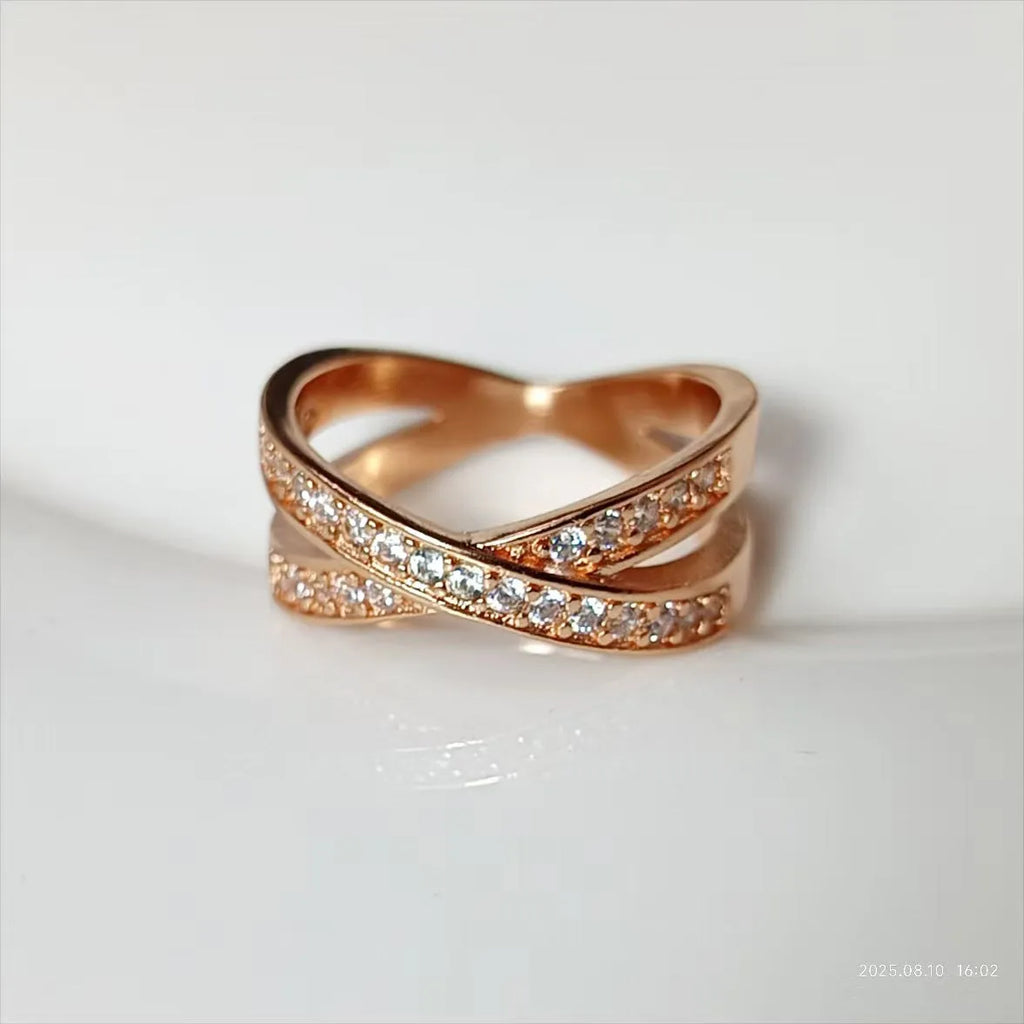 Geometric cross ring with heart design and micro-inlaid zircon on copper with electroplated finish