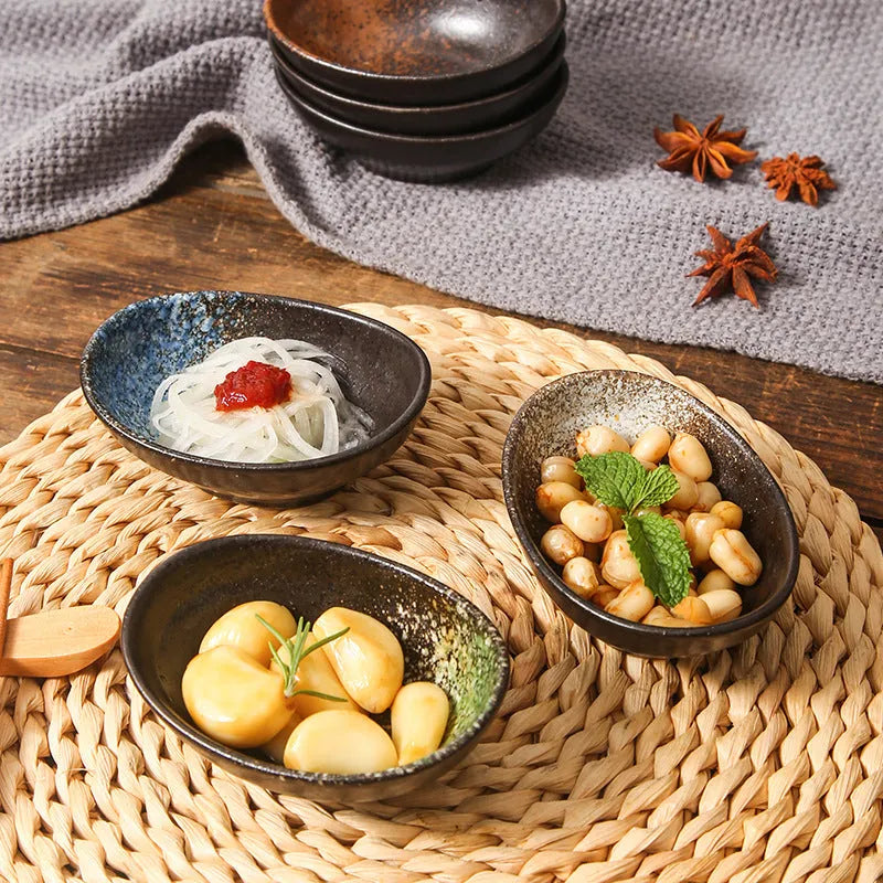 Japanese ceramic oval sauce dipping bowl with Edo pattern design and microwave-safe glaze