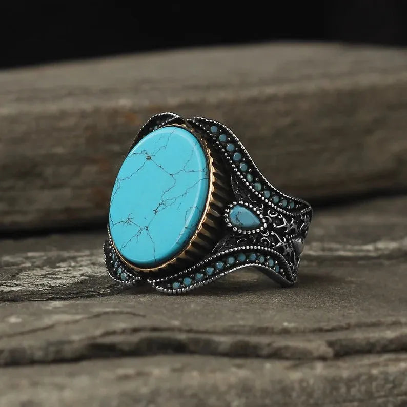 Men's round turquoise antique silver alloy ring showing simple design on size chart