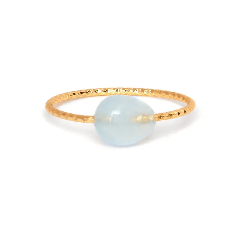 Geometric-shaped agate stone ring for women in various colour options on a neutral background.