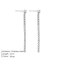 Geometric stainless steel zircon earrings in gold and steel colour on a white background.