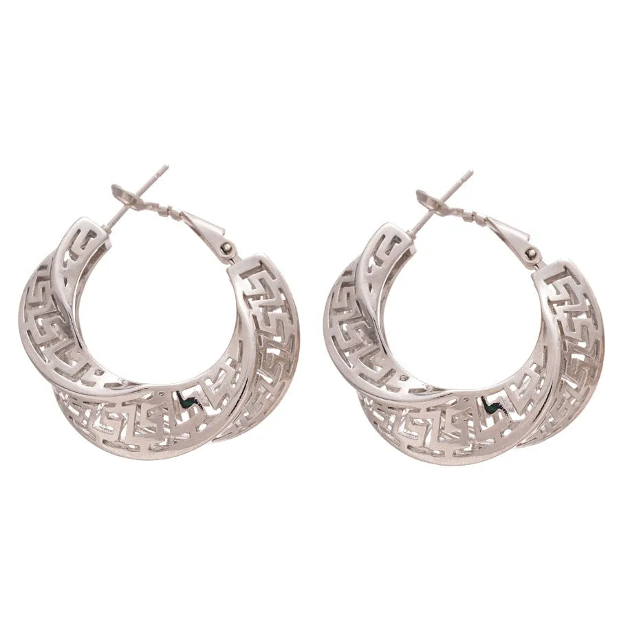 Women's geometric hollow stud earrings with twisted round design in gold or silver colour
