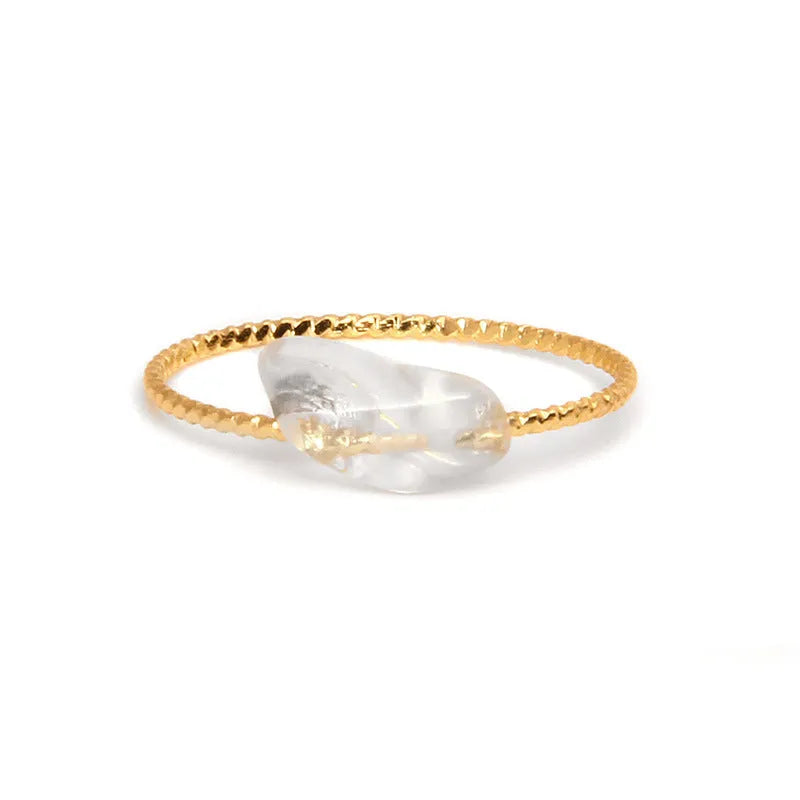 Geometric-shaped agate stone ring for women in various colour options on a neutral background.