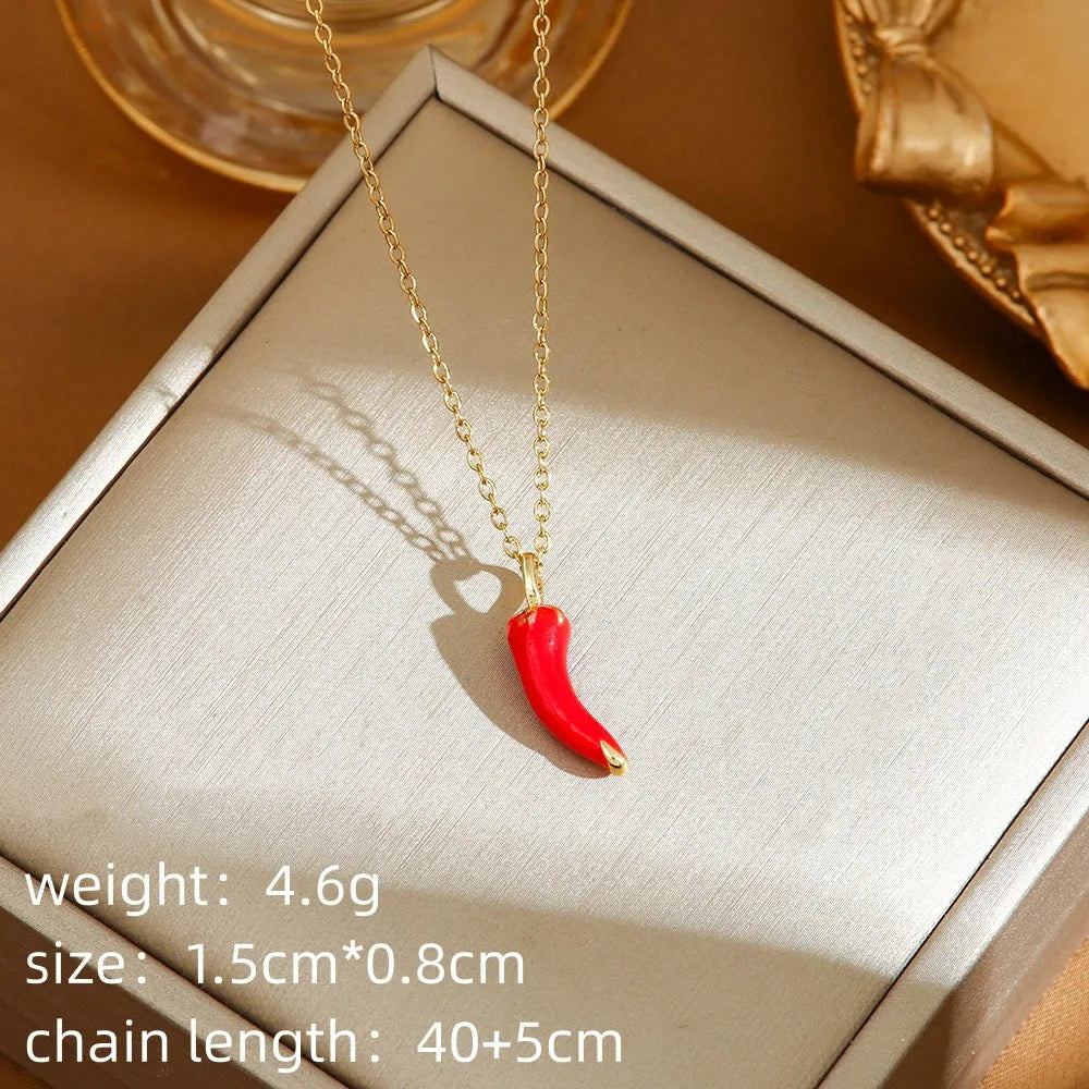 Titanium steel necklace with O-ring chain and delicate indie cherry pendant in golden finish