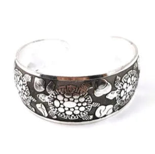 Silver alloy ethnic bracelet with carved Miao openwork patterns in turtle colour option