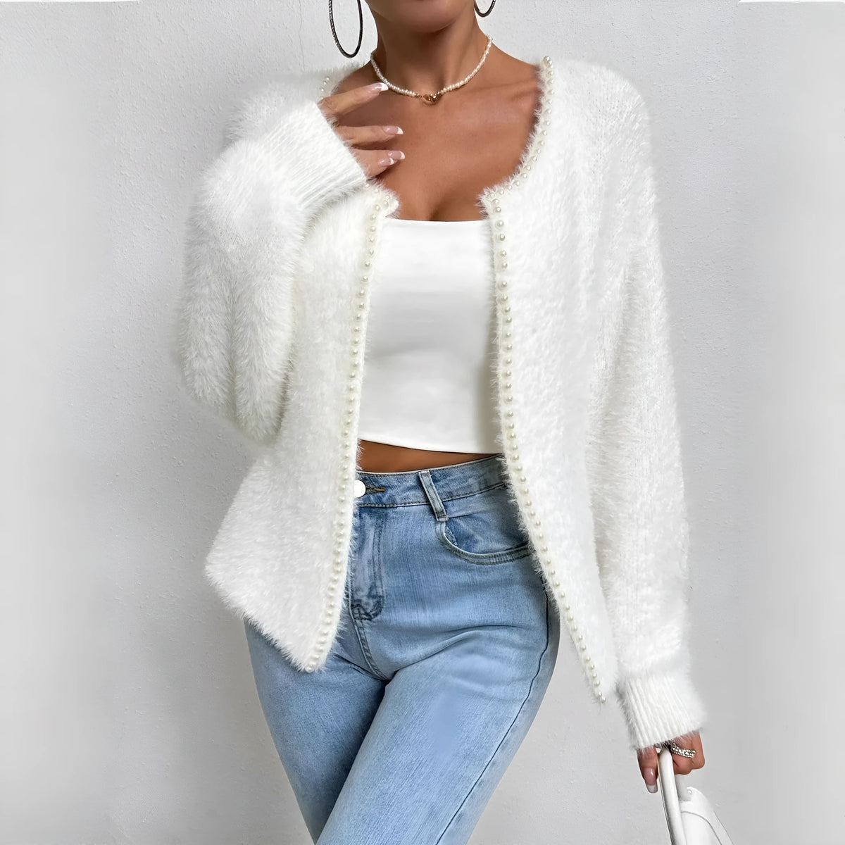 Women's white V-neck cardigan sweater with bead knitwork detailing