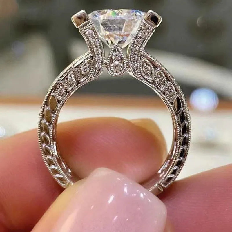 Alloy geometric women's ring with electroplated gold or white finish and round design elements