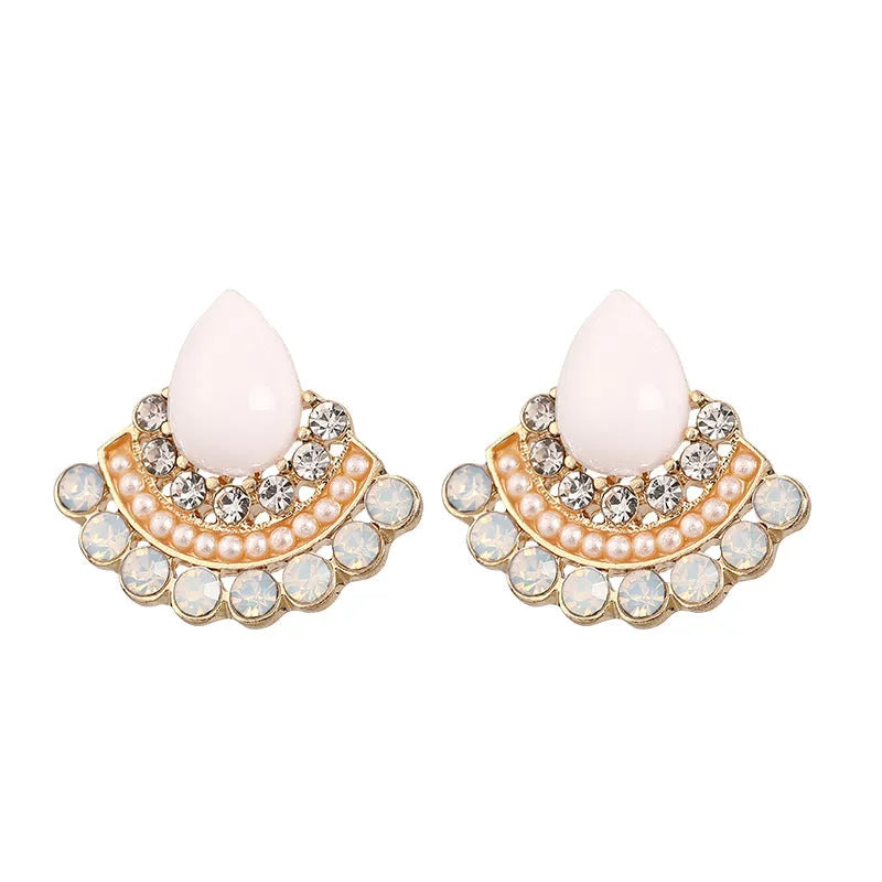 Women's retro fan-shaped silver needle earrings with rhinestone detailing on a geometric design.