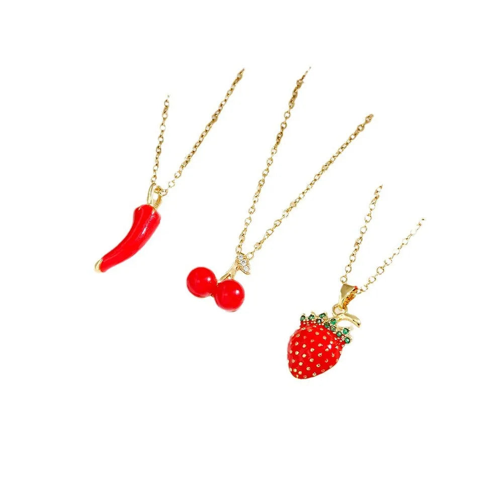 Titanium steel necklace with O-ring chain and delicate indie cherry pendant in golden finish