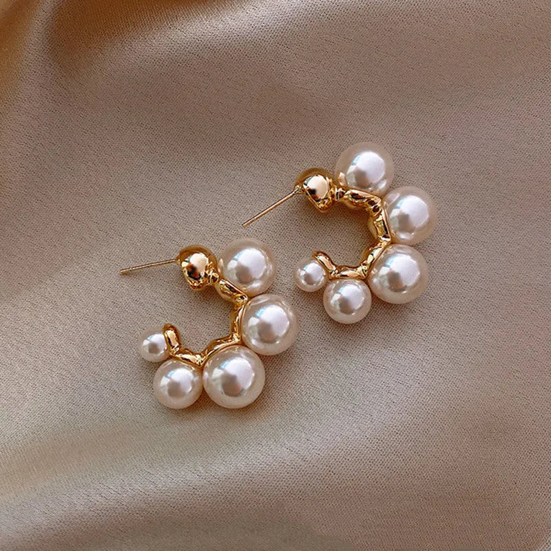 Red bell-shaped alloy earrings for women, also available in white.