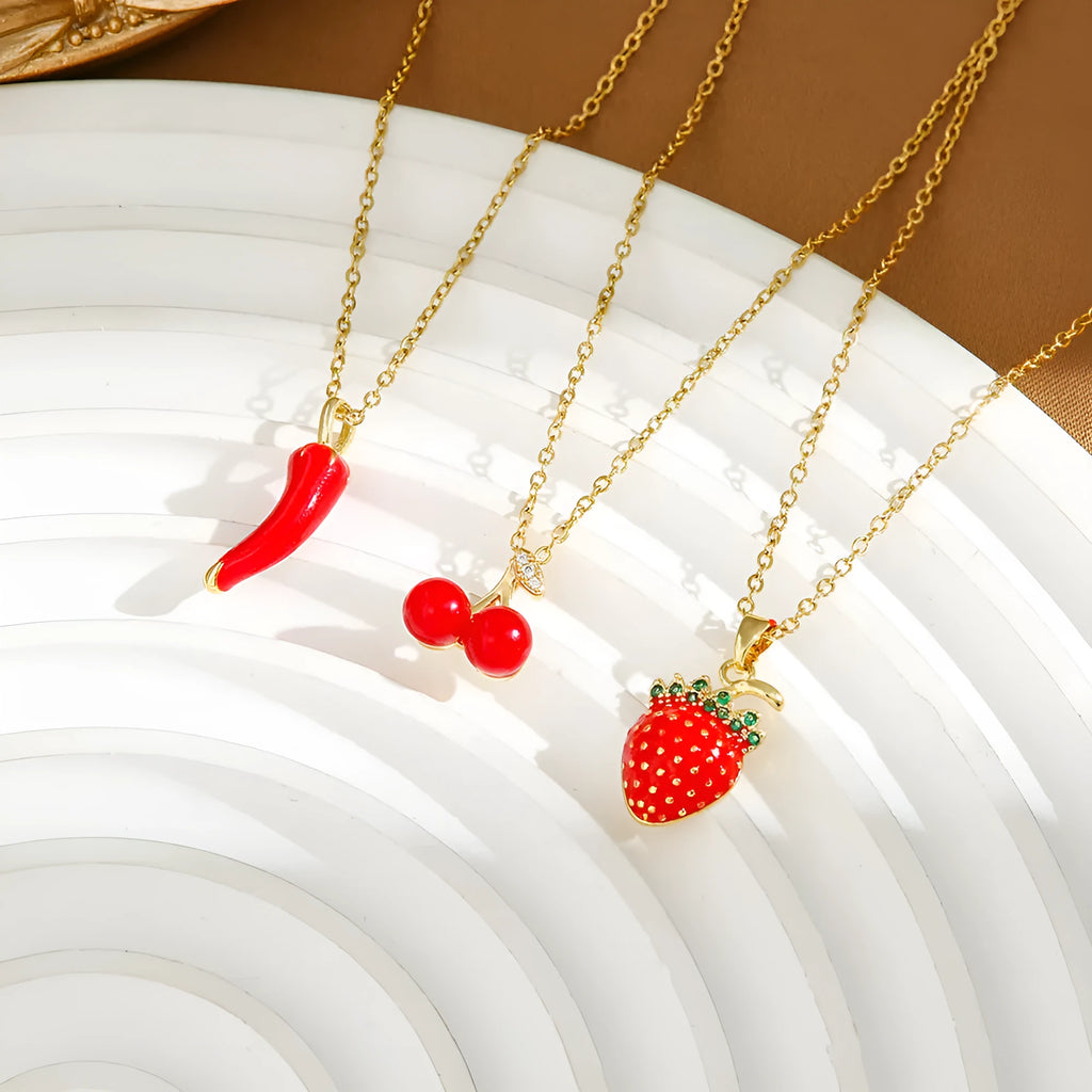 Titanium steel necklace with O-ring chain and delicate indie cherry pendant in golden finish
