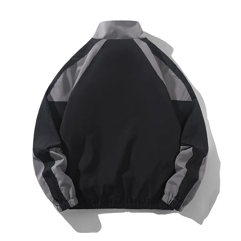 Men's black casual jacket with contrast stitching detail and side pockets, shown in loose fit for spring and autumn wear