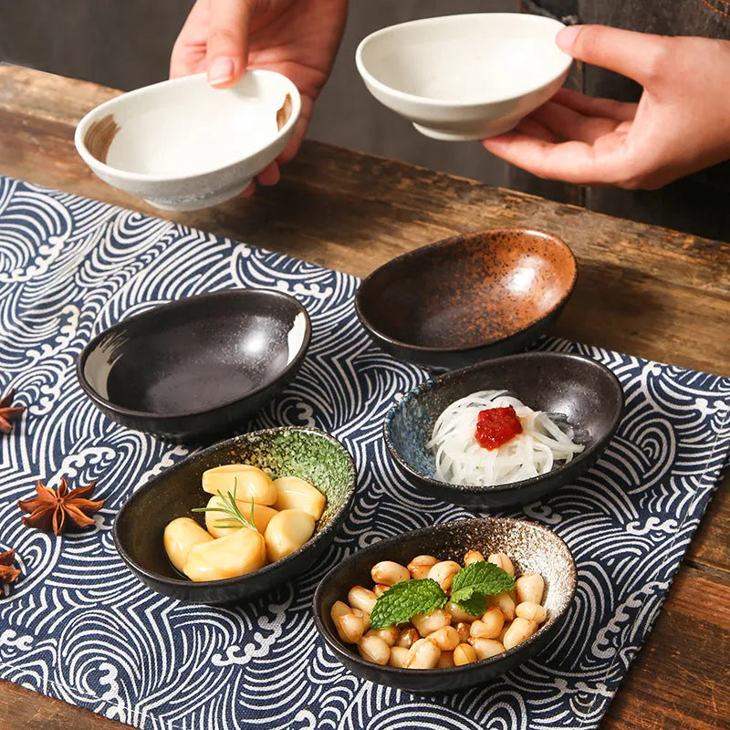 Japanese ceramic oval sauce dipping bowl with Edo pattern design and microwave-safe glaze