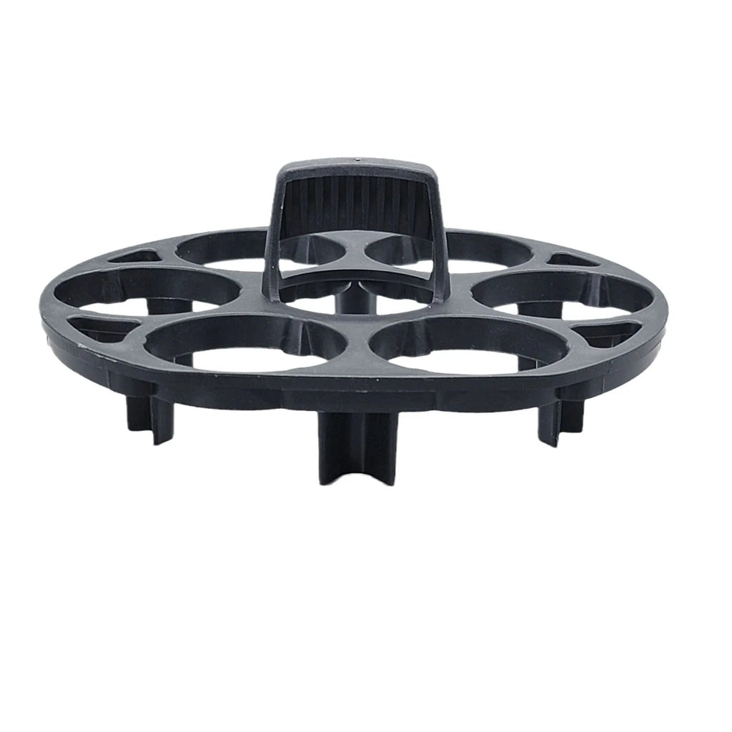 A black plastic egg holder rack on a kitchen countertop.