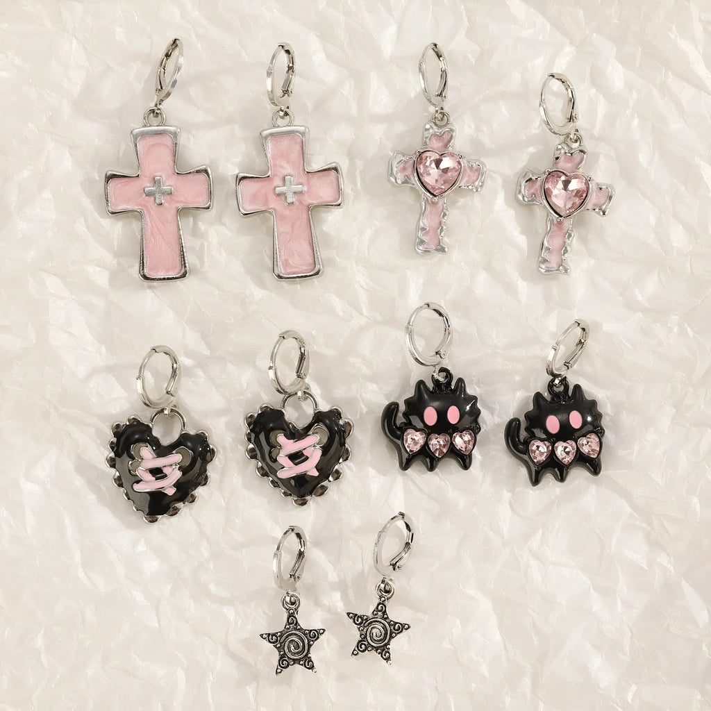 Women's alloy earrings with cross crystal design in five colour options including white, black cat, and antique silver
