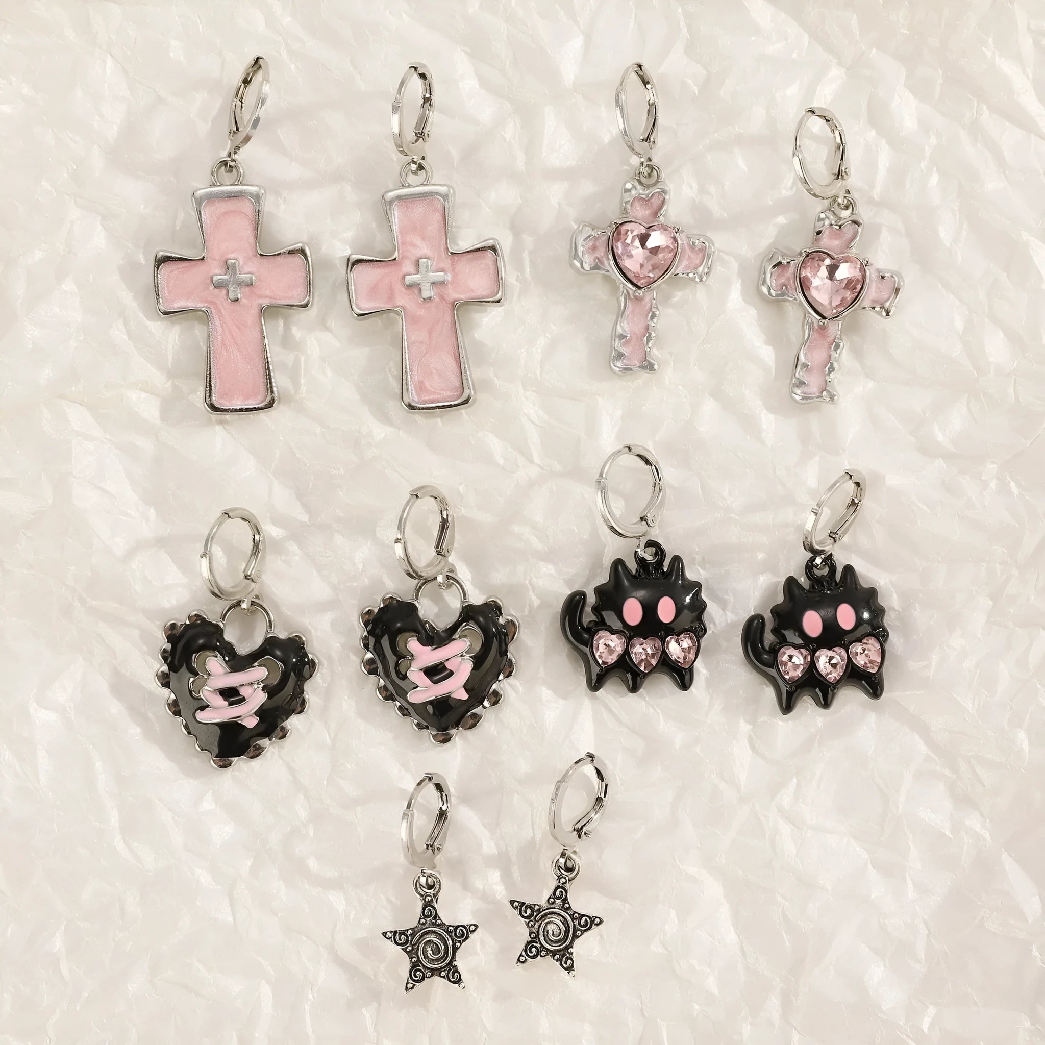 Women's alloy earrings with cross crystal design in five colour options including white, black cat, and antique silver