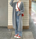 Women's loose chenille knitted cardigan with 3D pattern in dark grey colour showing 65cm length