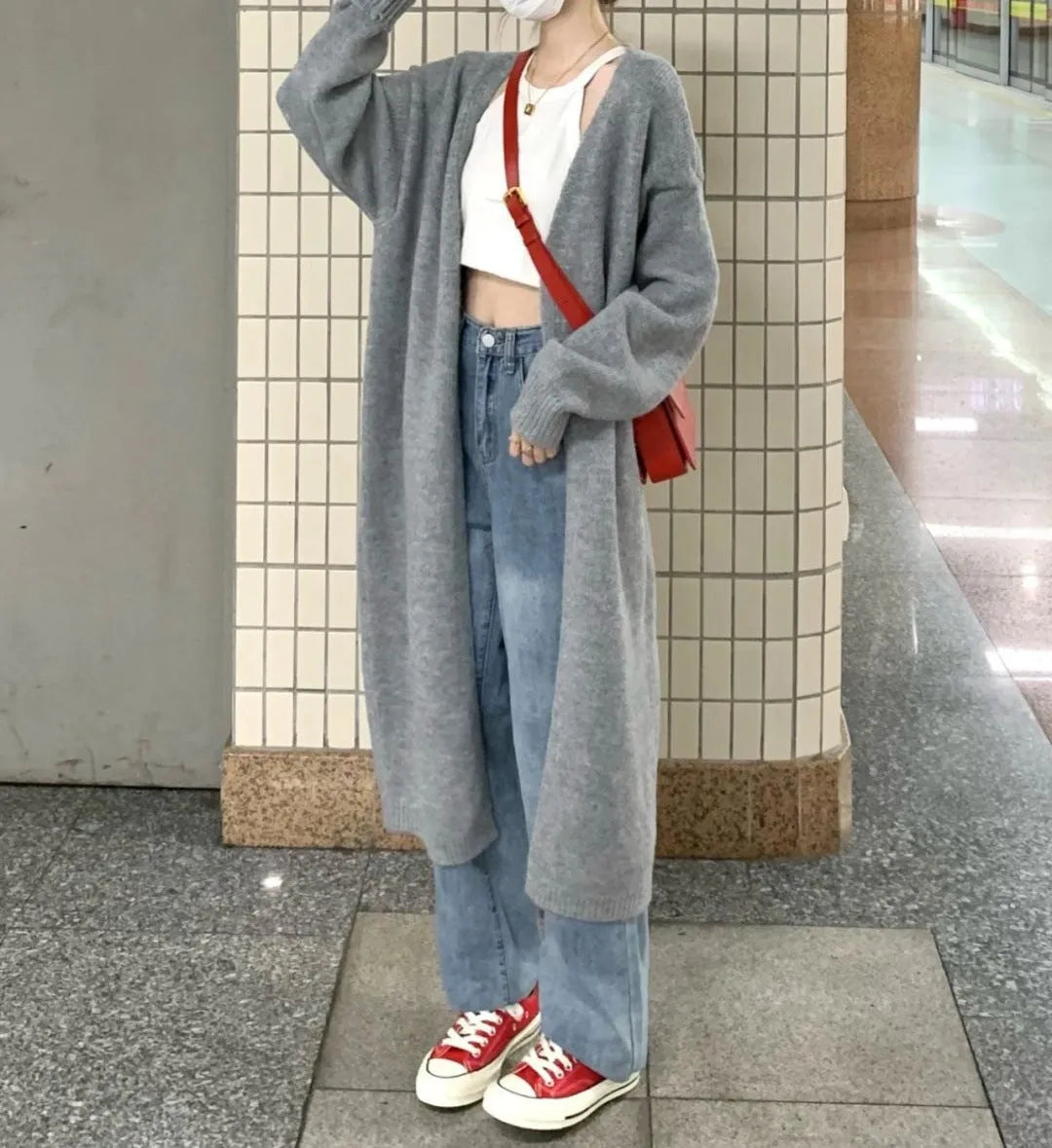 Women's loose chenille knitted cardigan with 3D pattern in dark grey colour showing 65cm length