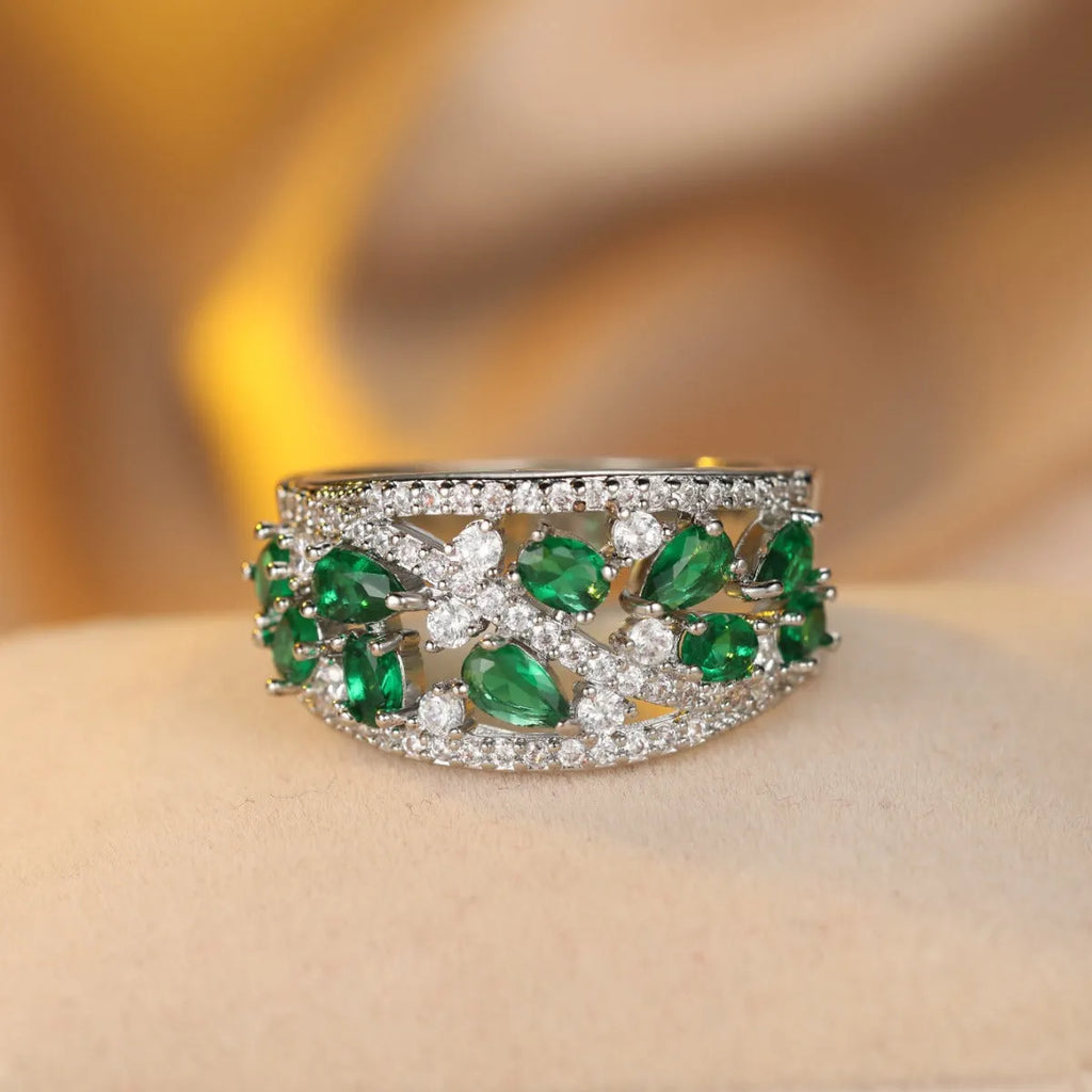 Women's hollow round copper fashion ring showing gold and platinum finish options with white and blue stone effects