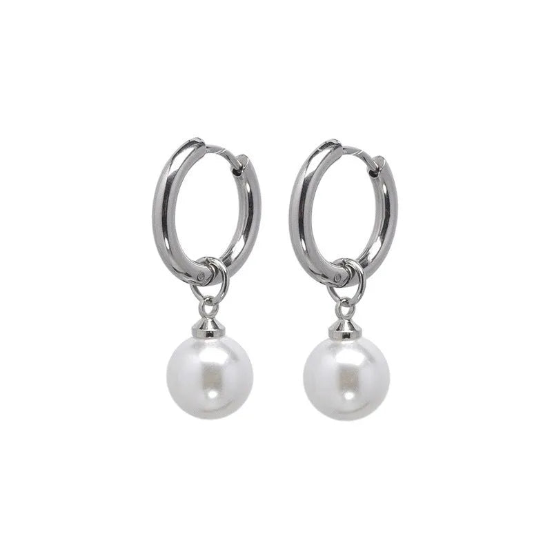 Pair of women's geometric pearl eardrops with titanium steel alloy and round elements in hip hop style