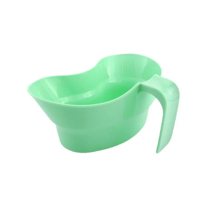 Green plastic gargle cup for bedridden elderly oral hygiene assistance