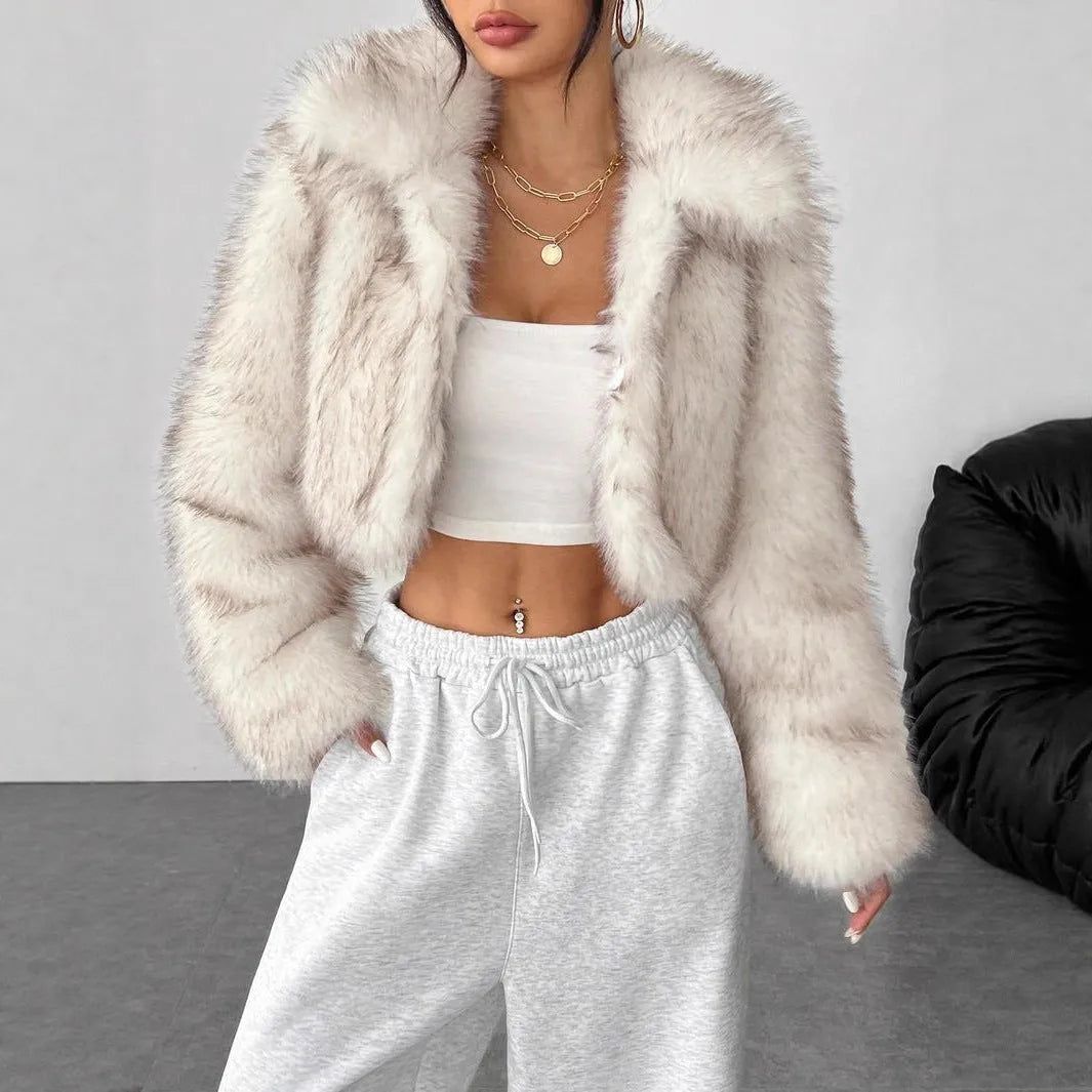 Artificial fur coat with fur collar in short length, showing thick pile construction and cute style design