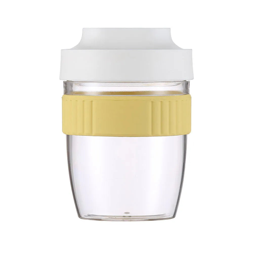 Green plastic salad cup with integrated spoon in lid, shown with leak-proof seal.