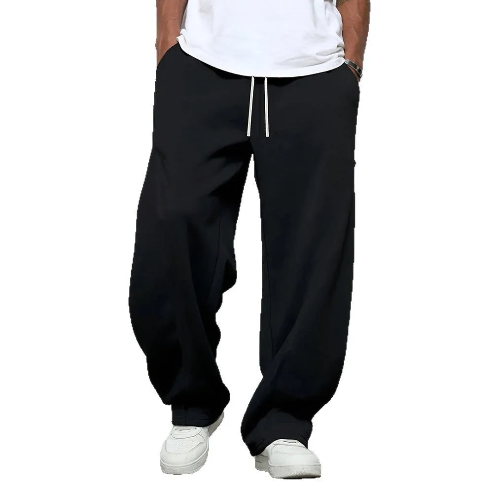 Men's straight-leg casual trousers in black with micro-elastic waistband and drawstring closure