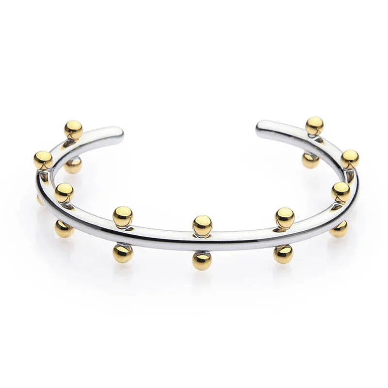 Stainless steel C-shaped bean beads with texture rivet detail in gold, steel, and steel gold colours.