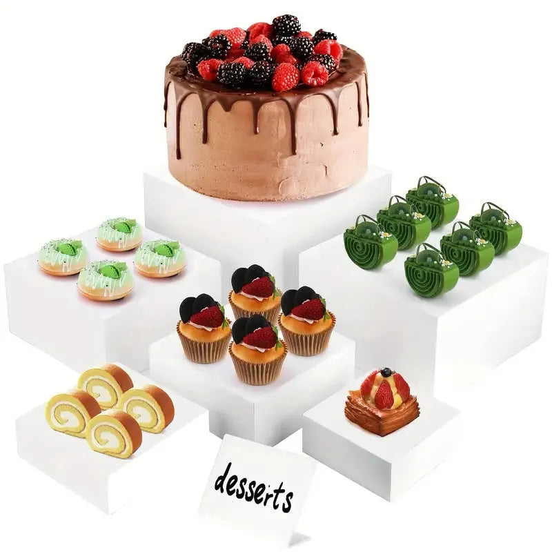 White plastic cube dessert display stand with stackable units for tiered cake and pastry presentation