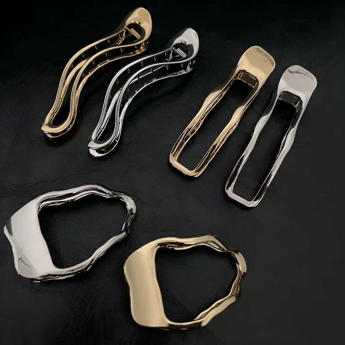 Gold and silver zinc alloy hair barrettes showing arc, square, and triangle shapes on a white background.