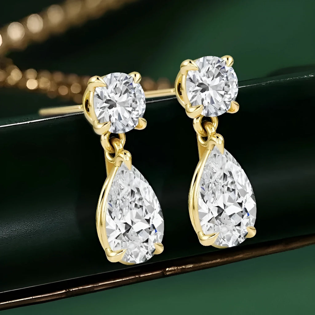 Sterling silver women's earrings with round and water drop moissanite stones