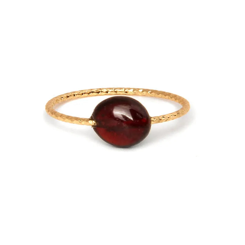 Geometric-shaped agate stone ring for women in various colour options on a neutral background.