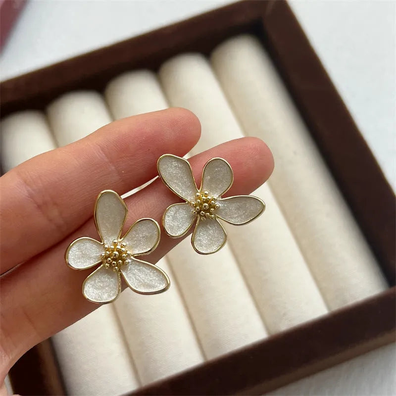 White drop oil petal earrings for women – five petal flower drop ear studs with glossy dripping oil finish on zinc alloy