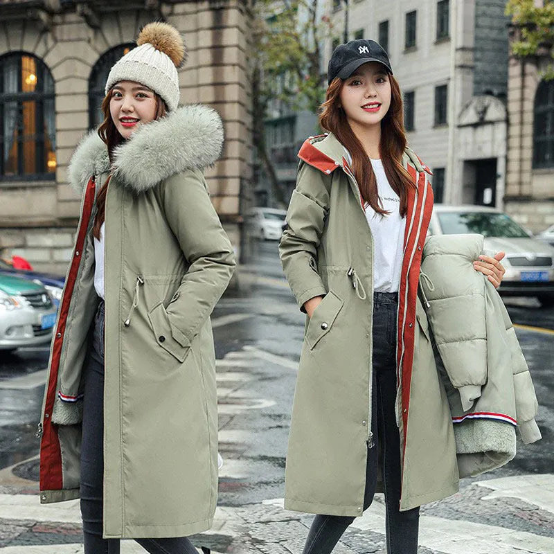 Women's long beige trench coat with fleece lining and a two-way zip front closure.