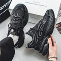 Men's beige sneakers with mesh upper and lace-up closure on rubber sole