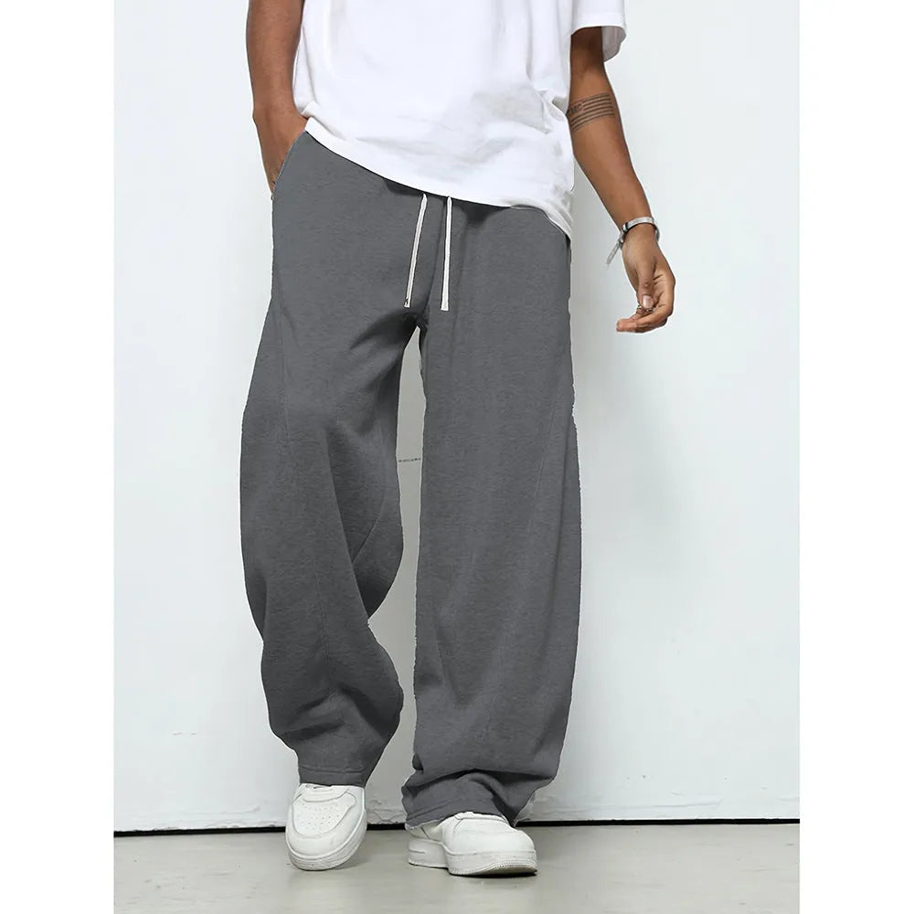 Men's straight-leg casual trousers in black with micro-elastic waistband and drawstring closure