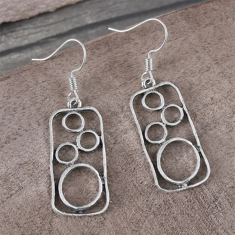 Geometric round earrings with irregular square design in antique silver zinc alloy