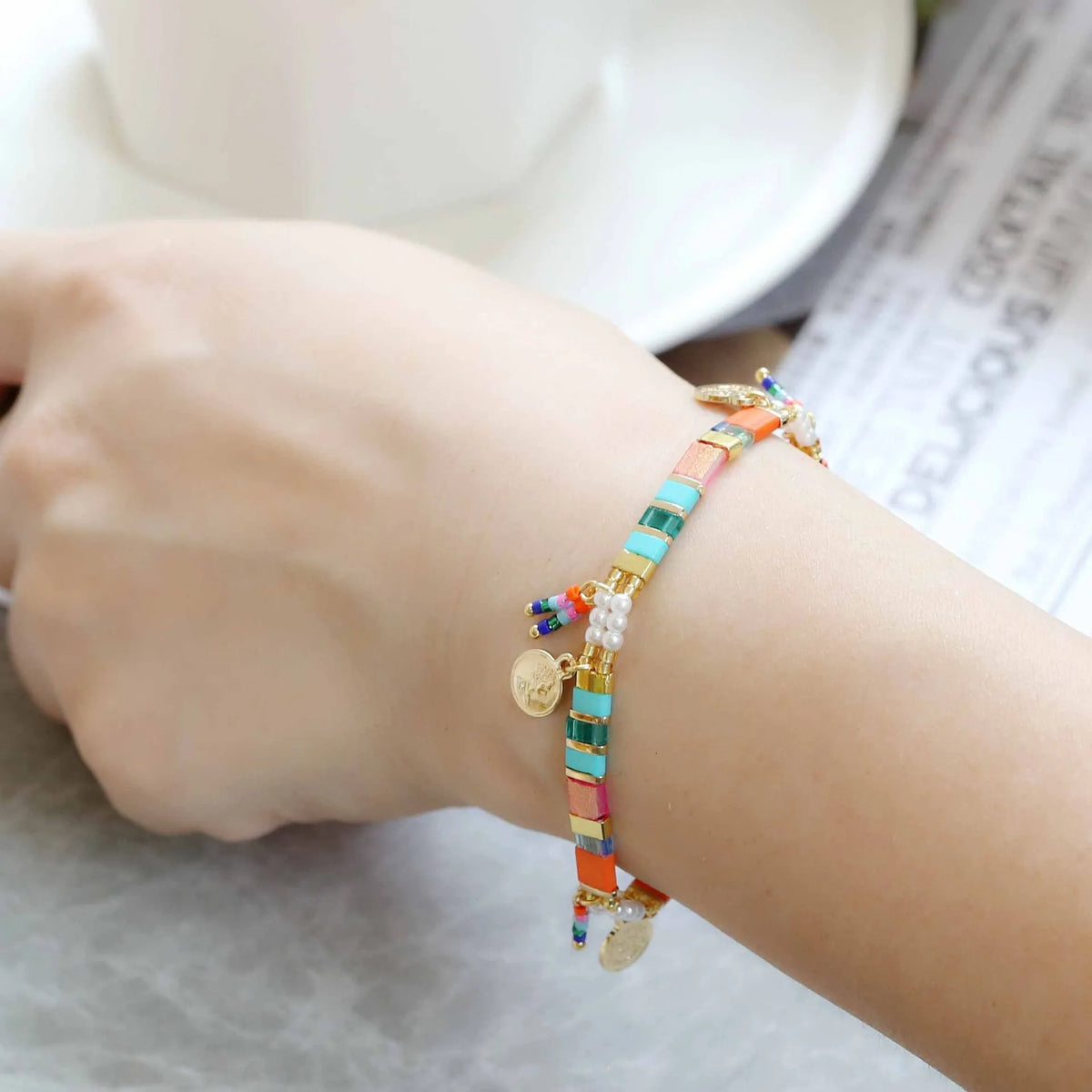 Women's handmade imitation pearl bracelet with glass coloured beads in original design