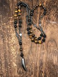 Men's stone cross pendant necklace with ball bead chain and safety lock clasp in geometric design.