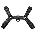 Black leather men's chest bondage strap with a large metal adjustment buckle.