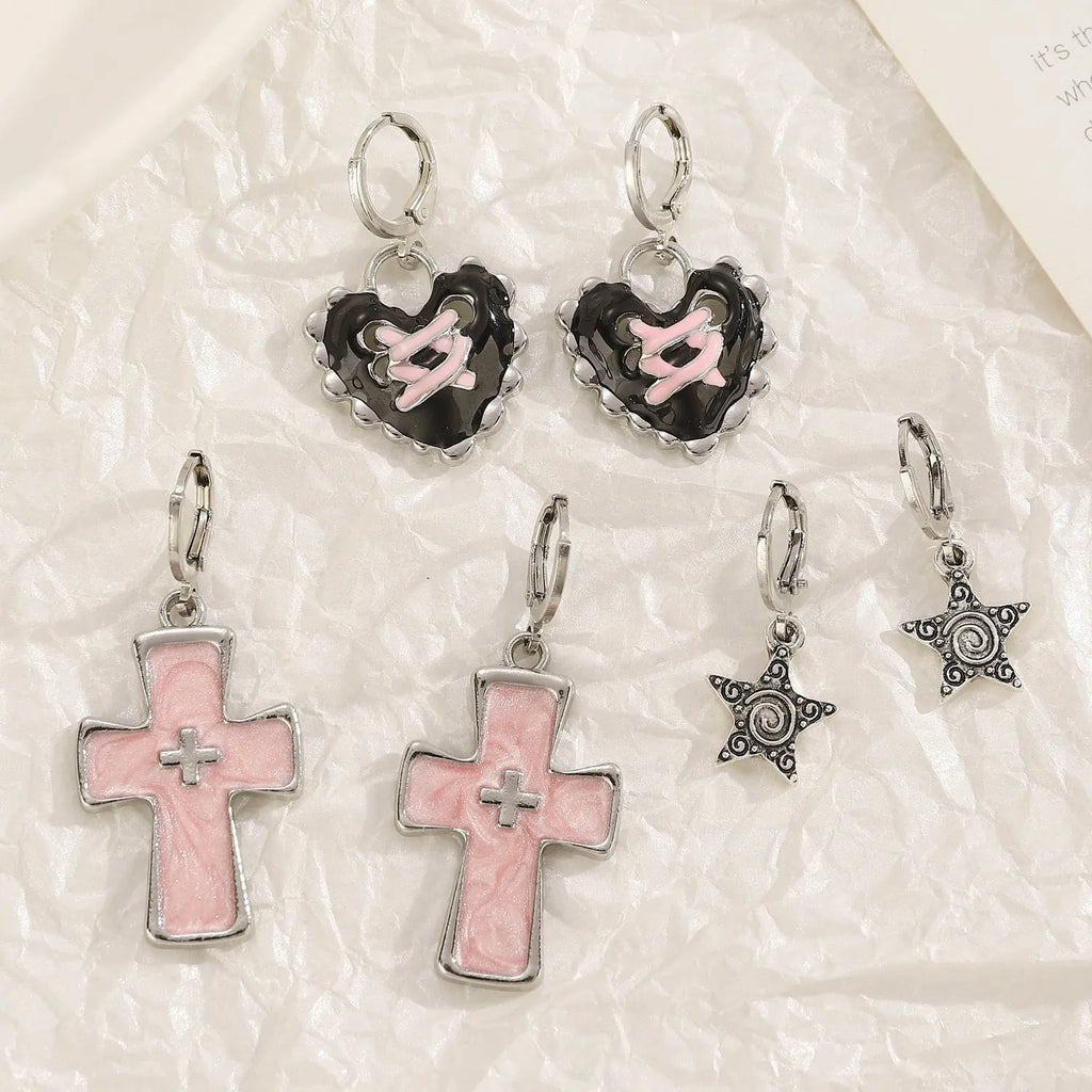 Women's alloy earrings with cross crystal design in five colour options including white, black cat, and antique silver